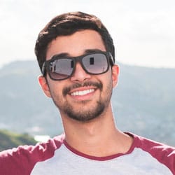 A man with sunglasses on smiling medical care