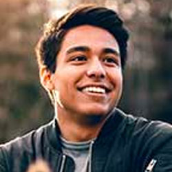 A man smiling for the camera Telehealth,
